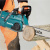 Аккумуляторная цепная пила XGT Makita UC016GZ01